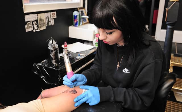 Ellie Phillip was among the tattoo artists in Leeds turning ink into toys with the 'Tatts4Toys' charity event.