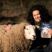 Grace Olson, therapist and author, with her new book Merlin Finds His Magic based on her therapy sheep Merlin. Photo: Submitted
