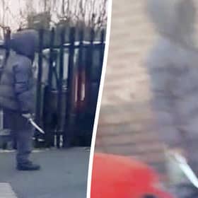The moment a hooded knifeman casually walked down the street brandishing a huge blade near a Birmingham primary school. Picture: Birmz Is Grime / SWNS