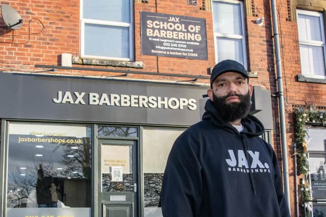 Tonie Browne, of Jax Barbershops, celebrated this week as former students stepped into teaching roles at his successful barbering school. Photo: Tony Johnson.