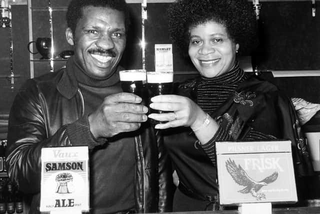 Gertrude Paul and Harry Stapleton raise a glass at the the opening of the new £200,000 West Indian Centre in Chapeltown in January 1982.