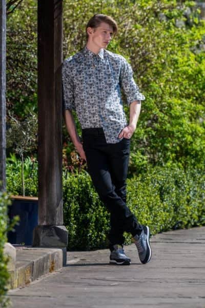Josh wears: Grey printed Holland Esquire shirt, £125, at Abraham Moon. Silver and amber heart pendant, £339.93, W Hamond; jeans, model's own; Kurt Geiger Alfie shoes, £69, at Kurt Geiger. Picture James Hardisty. Styling and shoot production: Stephanie Smith
