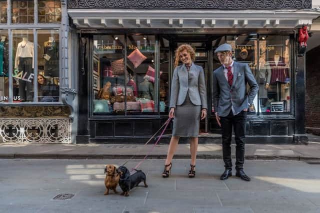 With guest canine models Heidi and Ruby - Jess wears: Pink Arthur Shirtley shirt, £120; grey Abraham Moon skirt, £109, and blazer, £270, all stocked at Abraham Moon. Jet and pearl bracelet, £182.95, and necklet, £498, both W Hamond; black zip heels, £99, Carvela Kurt Keiger. Josh wears: White Holland Esquire shirt, £90; grey Holland Esquire blazer, Â£375; red fox tie, £15; grey flat cap, £38, all stocked at Abraham Moon. Jeans, model's own; shoes, by Kurt Geiger. Picture James Hardisty. Styling and shoot production: Stephanie Smith. Hair: Emma Tierney at Ross Charles. Make-up: Ash Fehners.