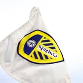 Leeds United logo on a flag.