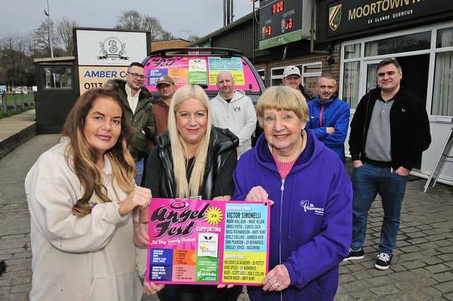 Becky and Shelley Joyce, co-founders of Homeless Street Angels, with Pat Campbell, volunteer at St Gemma's Hospice with the Angel Fest flyer. Photo: Steve Riding