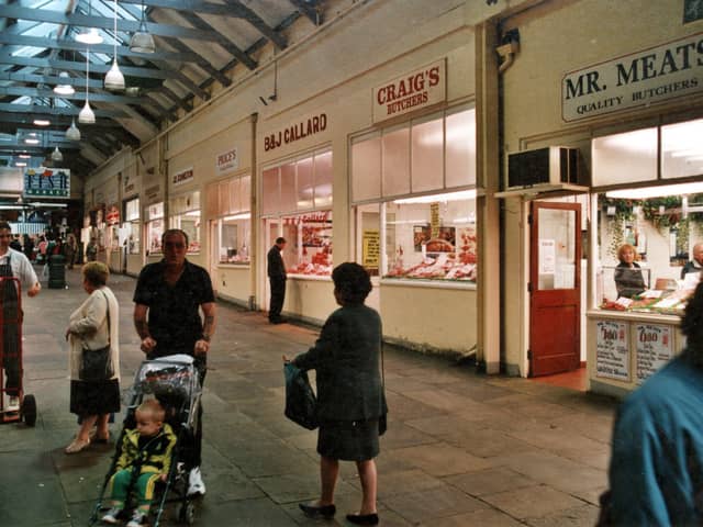 This photo from September 1999 shows some of the 20 plus shops contained within Butchers Row. Prices, B.& J. Ballards, Craigs and Mr. Meats shops are prominent in this photo.