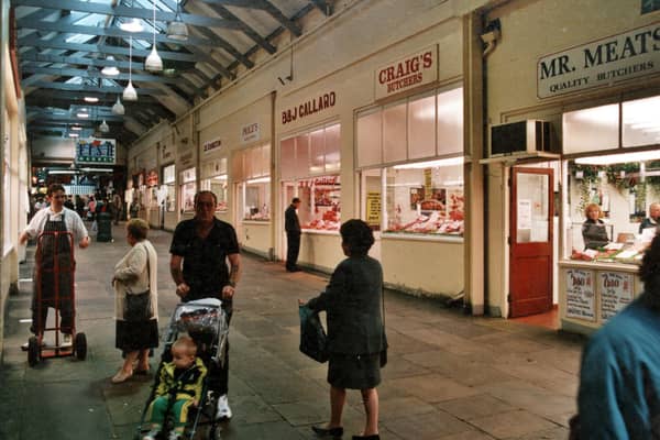 This photo from September 1999 shows some of the 20 plus shops contained within Butchers Row. Prices, B.& J. Ballards, Craigs and Mr. Meats shops are prominent in this photo.
