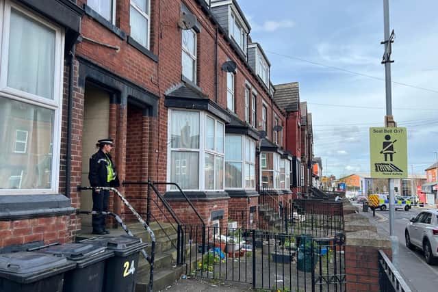 Police guard a property in Tempest Road, Beeston, where a woman's body was found. A man has been arrested on suspicion of murder. (Photo by Steve Riding)