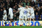 Sam Byram of Leeds United celebrates scoring his team's first goal with teammates during the Sky Bet Championship match between Leeds United and Hull City at Elland Road on April 01, 2024 in Leeds, England. (Photo by Ed Sykes/Getty Images) 