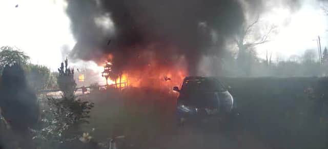 Ambulance explodes and bursts into flames in Barton-under-Needwood, Staffordshire.