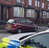 Police on Tempest Road, Beeston, where a woman's body was found. A man has been arrested on suspicion of her murder. (pic by National World)