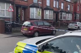Police on Tempest Road, Beeston, where a woman's body was found. A man has been arrested on suspicion of her murder. (pic by National World)