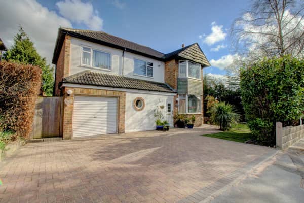 A stunning modern family home on a desirable corner plot is on the market.