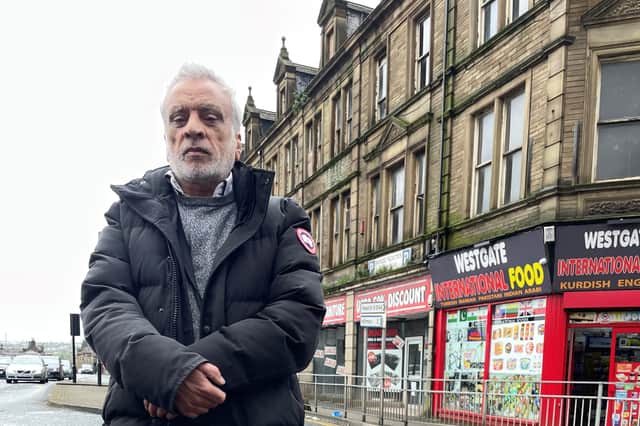 Shopkeeper Geo Khan went to the aid of a young woman who was stabbed to death in the street as she pushed her baby in a pram on Saturday afternoon in Bradford city centre