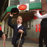 Pupils entertained customers at the city's St Johns Post Office as part of a special competition to celebrate the Millennium in June 1999. Pictured are clarinet player Rachel Covey, acrobat Richard Canning and Nestor Matthews as Charlie Chaplin.