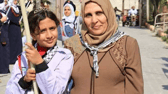 Mahmoud's mother and one of his sisters