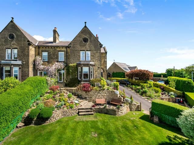 This highly desirable residence with magnificent gardens and views is on the market for £1,150,000.