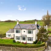 Riffa House is a beautifully designed family home with two cottages near Leeds.