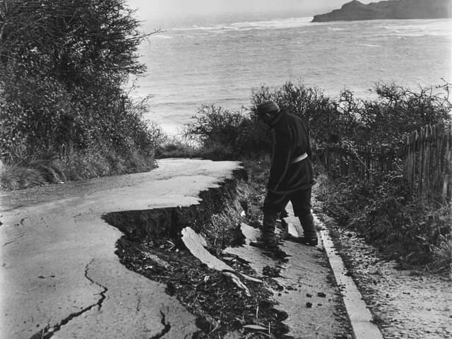 Movement of land caused damage to a road leading down into Runswick Bay in November 1966. The road cracked and, in parts, sank by as much as three feet  after cliff movement. This is the Old Bank Road, which was replaced by the present bank road in the late 1960s.
