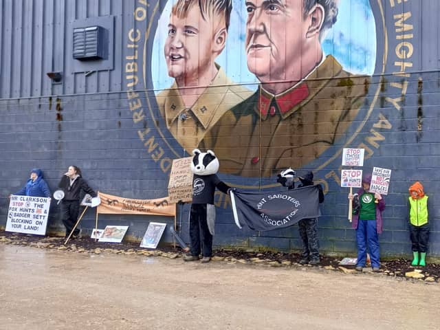Protesters gather outside Jeremy Clarkson's farm shop in Chadlington, Oxon