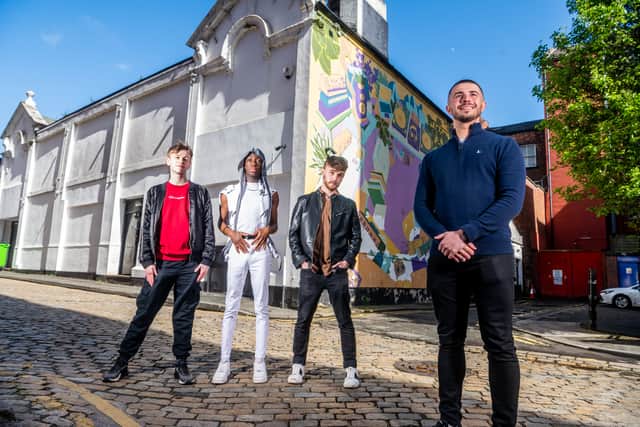 Daniel pictured with DJ Owl and performers Seth and Jack Warren (Photo by James Hardisty)