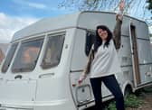 Hayley Rubery in front of her caravan. 