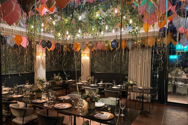 The private dining room had been filled with balloons. Photo: National World.