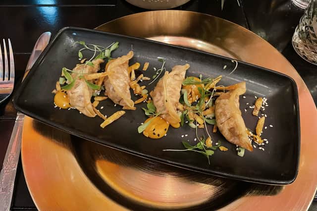 The duck gyoza at the Grand Pacific, presented elegantly with a sweet potato, miso and hoisin sauce. Photo: National World.