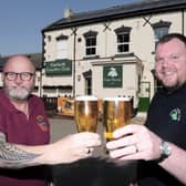 Mark Dobson (left) and Danny Wilson, steward at Garforth Country Club, are busy preparing for the ale festival which will take place later this month. (pic by National World)