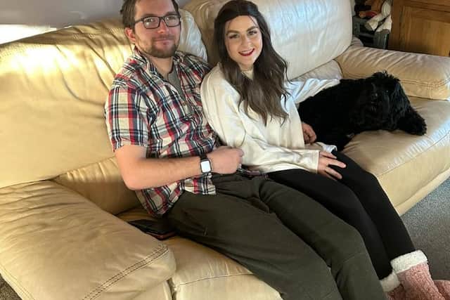 Rebecca and Kris with their dog Smokey (Rebecca Moss / SWNS)