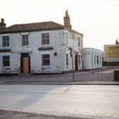 The Spread Eagle pub at Gildersome Crossroads, taken in Jun e 1968 just prior to its demolition. The crossroads were to be reconstructed at the time to facilitate the building of the M62 in the vicinity. A large hoarding for the pub is still up advertising dancing six nights a week.