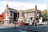 Hyde Park Public House at Hyde Park Corner pictured in October 1999. This photo is looking from Woodhouse Lane with Woodhouse Street on the right. Headingley Lane just visible with Headingley Estates, estate agents on corner.