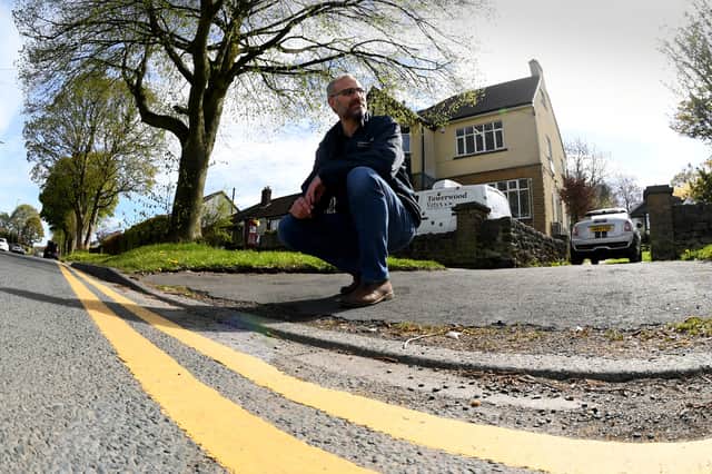 Brendan Clarke, owner of Towerwood Vets in Cookridge, where double yellow lines have been placed outside the practice. He claims it is destroying the business. Photo: Simon Hulme