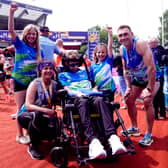 Rob Burrow alongside wife Lindsey (who ran the half marathon), daughters Macy and Maya and Kevin Sinfield who ran the full marathon all pose for a picture after the Rob Burrow Leeds Marathon.