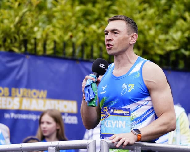 Kevin Sinfield speaks to the crowd before the Rob Burrow Leeds Marathon.