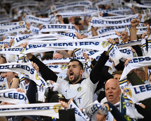 Leeds United fans hold up scarfs in the stands prior to the Sky Bet Championship Play-Off Semi-Final 2nd Leg match between Leeds United and Norwich City at Elland Road on May 16, 2024 in Leeds, England. (Photo by Michael Regan/Getty Images)