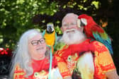Spider, 66, and Anne Spider-McKeown, 64, from Birmingham, go about their daily routine with two parrots Charlie a green-winged Macaw and Chester, a blue-and-gold Macaw. May 19, 2024. 