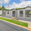 A brand-new modern park home in a quiet caravan park is on the market.