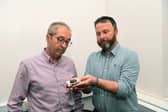 Prof Simon Kelley from the University of Leeds (left) examined the suspected meteorite found by Dan Charlton