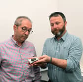 Prof Simon Kelley from the University of Leeds (left) examined the suspected meteorite found by Dan Charlton