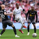 Crysencio Summerville (C) vies with Southampton's Will Smallbone (L) during the play-off final football match between Leeds United and Southampton at Wembley Stadium  (Photo by ADRIAN DENNIS/AFP via Getty Images)