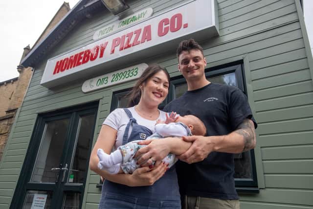 Homeboy Pizza Co owner Harry Pykett with wife Katie and baby Remy. Photo: Bruce Rollinson 