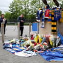 Fans pay tribute outside Headingley Stadium in Leeds to rugby league legend Rob Burrow following his death aged 41.