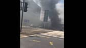 Thick plumes of black smoke covered the area after the car caught fire -Credit:Rick Bache/Facebook