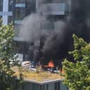 Fire rages at 22-storey tower block.
