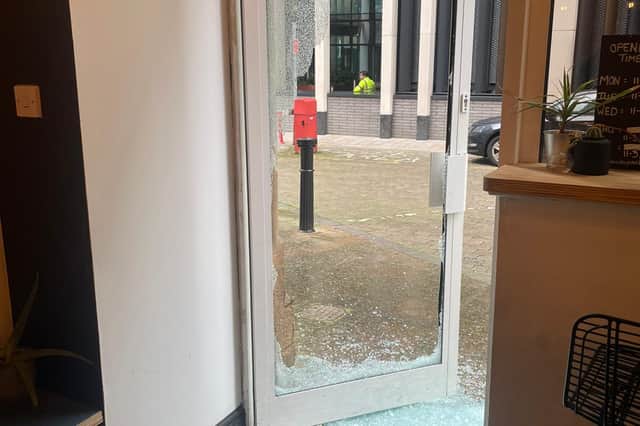The glass door at Shokupan was smashed through