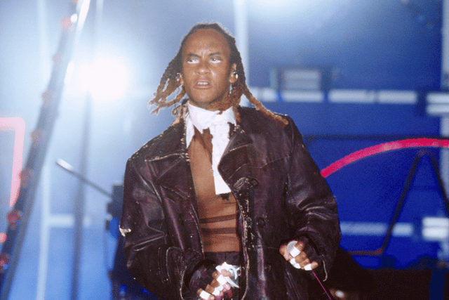 MC Maxim, performing live on the main stage with The Prodigy at Leeds Festival 2002. The electronica giants will be performing on the main stage at the Isle of Wight Festival 2024 at 10:30pm on Friday (Credit: Getty Images)