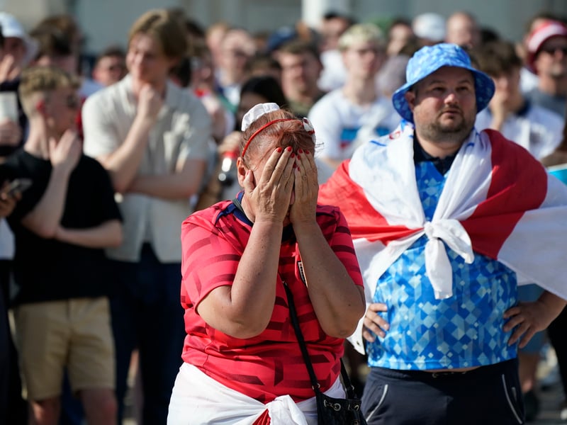 Dejected England fans at the Millennium Square in Leeds watching the UEFA Euro 2024 Group C match between Denmark and England.