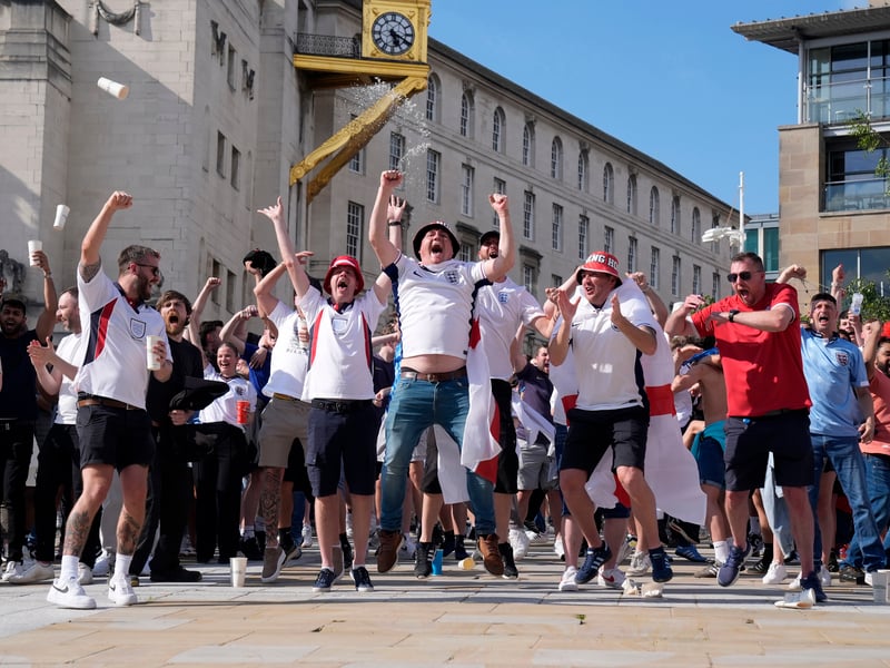 England fans celebrate their side's first goal at Millennium Square in Leeds watching the UEFA Euro 2024 Group C match between Denmark and England.