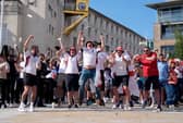 England fans celebrate their side's first goal at Millennium Square in Leeds watching the UEFA Euro 2024 Group C match between Denmark and England.